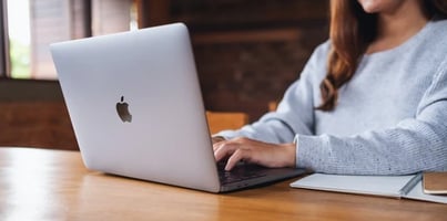 Person using an Apple computer.